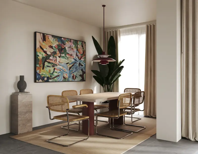 Dining room with cantilever cane chairs, a colourful abstract painting and a red pendant lamp.