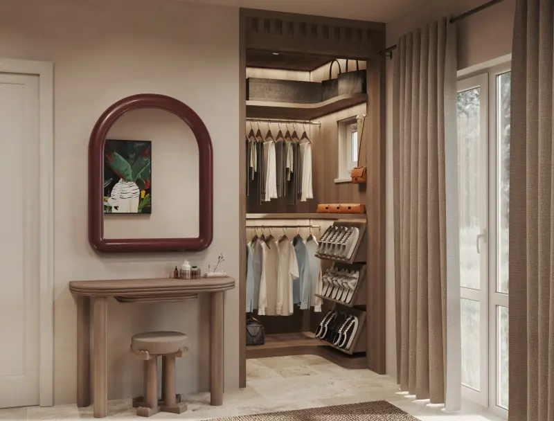 Daylit dressing corner with a curtained window, an oak console and an open wardrobe of shirts and shoes.