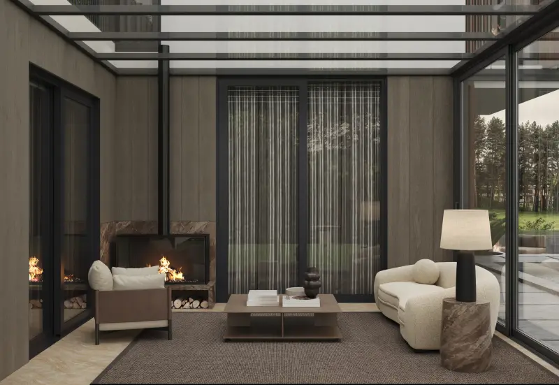 Winter garden with a glazed roof, a marble fireplace and forest views through floor-to-ceiling windows.