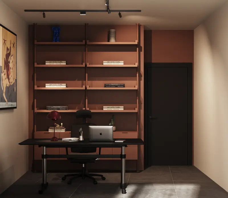 Study wall with floor-to-ceiling terracotta shelving, a black desk and track lighting.